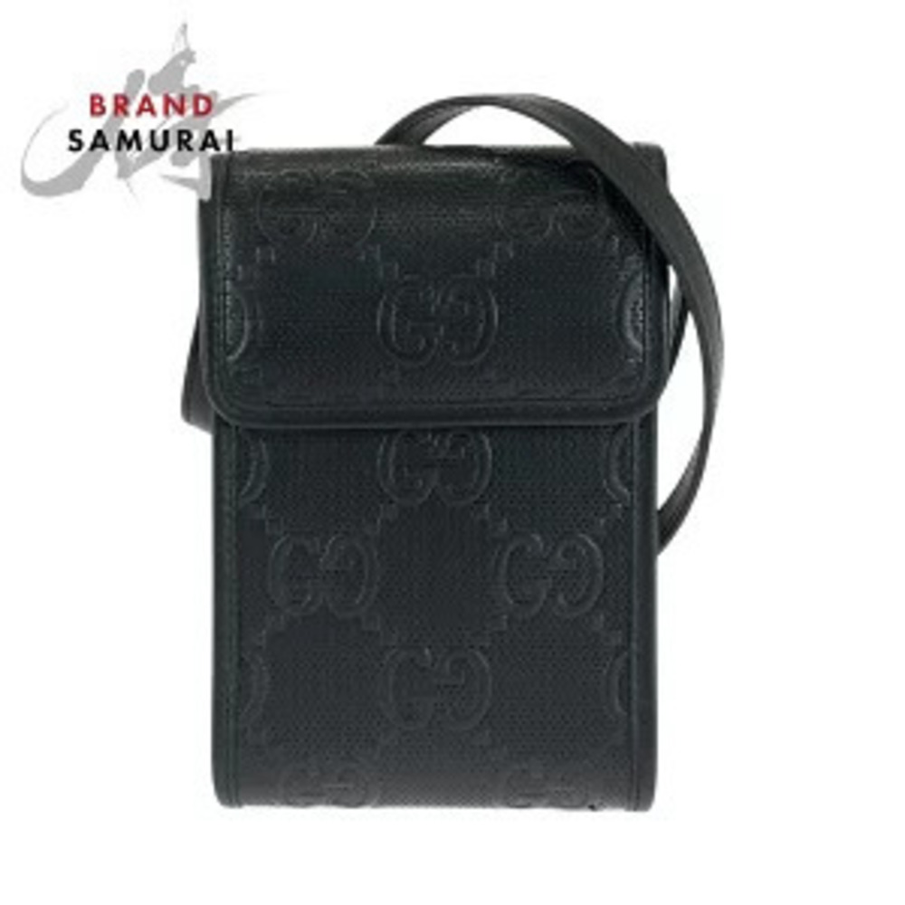 Gucci GG embossed black leather shoulder bag pouch
